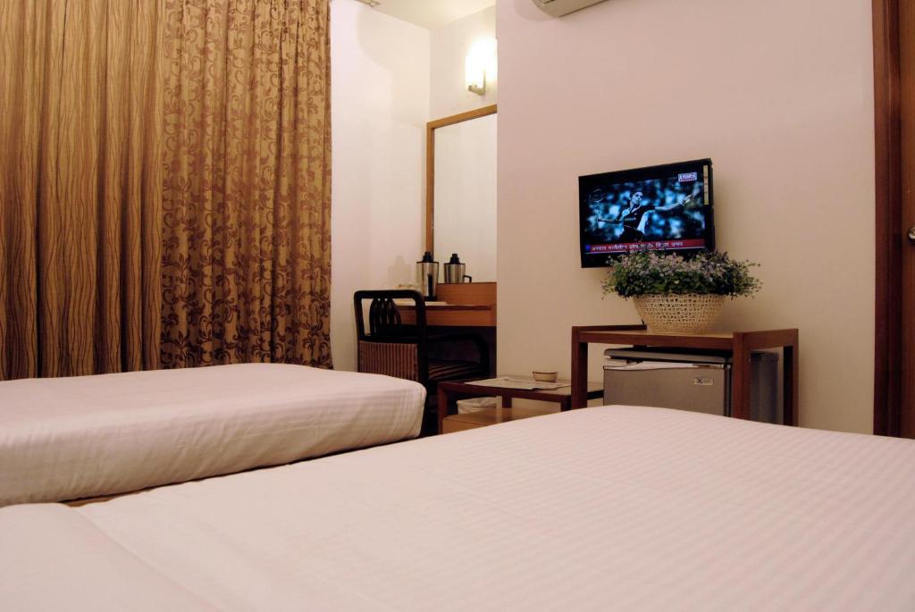The Ambience Hotel 浦那 客房 照片